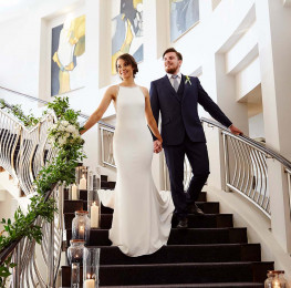 Bride & Groom on the Red Cow Moran Hotel Staircase